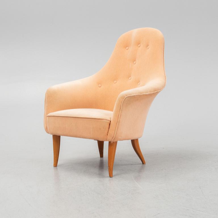 Kerstin Hörlin-Holmquist, a 'Lilla Eva' armchair, from the series 'Paradiset', Nordiska Kompaniet, mid 20th Century.