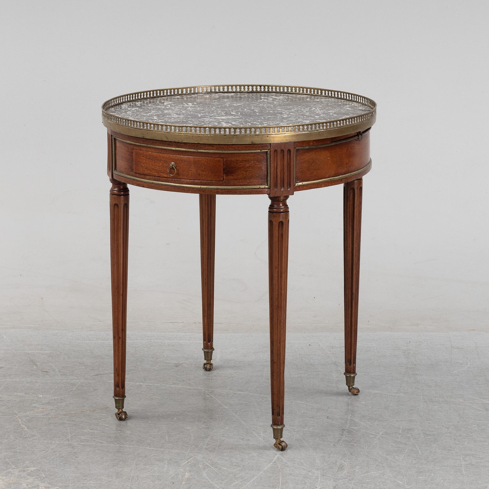 A Louis XVI-style table end of the  19th Century.