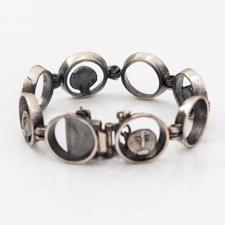 Jorma Laine, Rannekoru "Mörökölli", sterlinghopeaa. Turun Hopea, Turku.