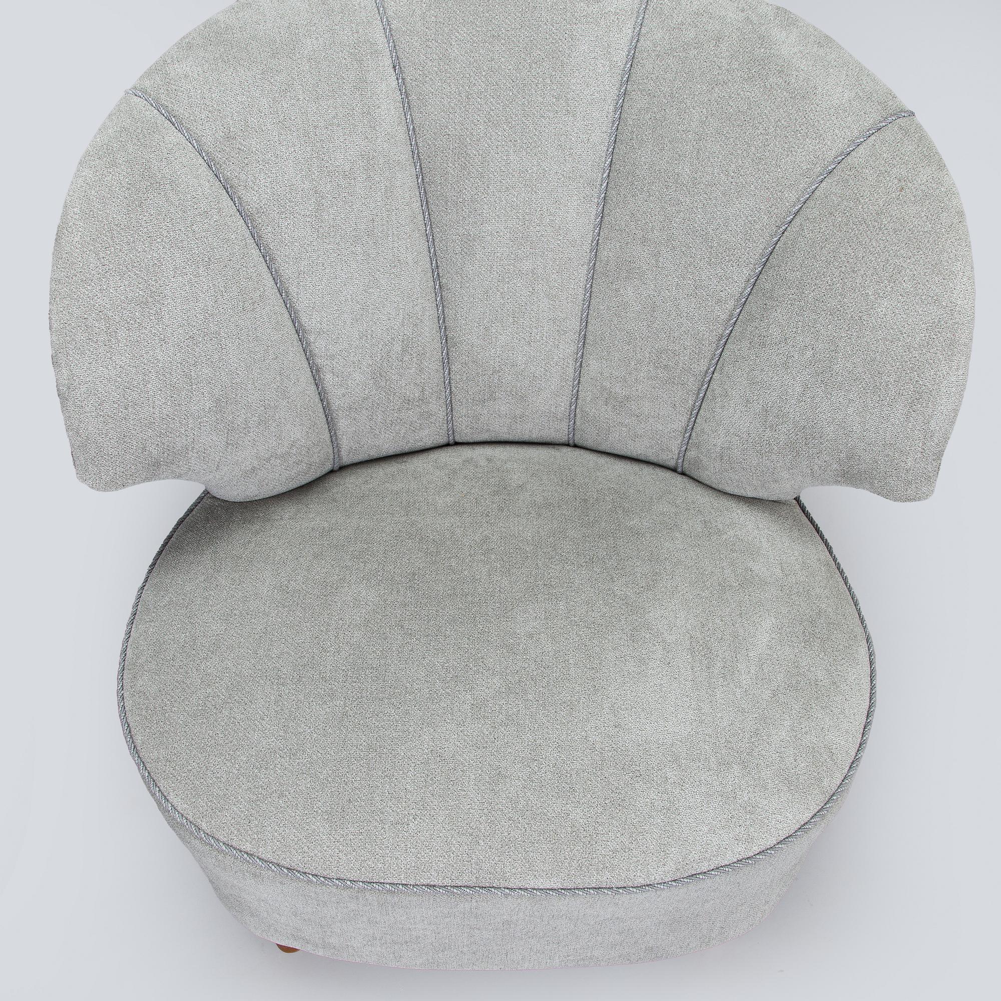 A pair of mid 20th century armchairs.