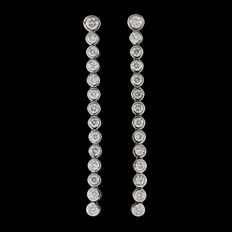 A pair of brilliant-cut diamond earrings. Total carat weight circa 2.40 cts.