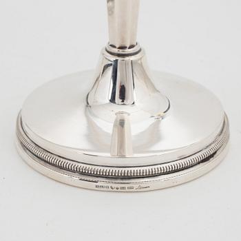 Eric Löfman, a pair of silver candlesticks, MGAB, Uppsala, 1976.