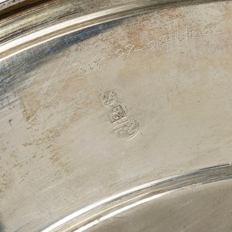 A pair of Persian silver plates, 20th century.