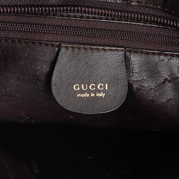 Gucci, a handbag.