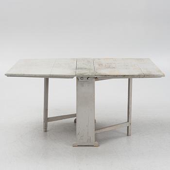 A 19th century gate-leg table.