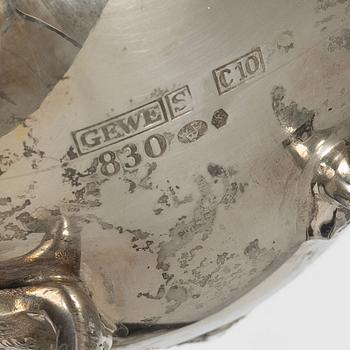 A silver Rococo style coffee pot, creamer and sugar bowl, Swedish import mark of Gewe Silvervarufabriken Ab, Malmö, 1977.
