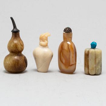 Nine Chinese glass and stone snuff bottles, 20th century.