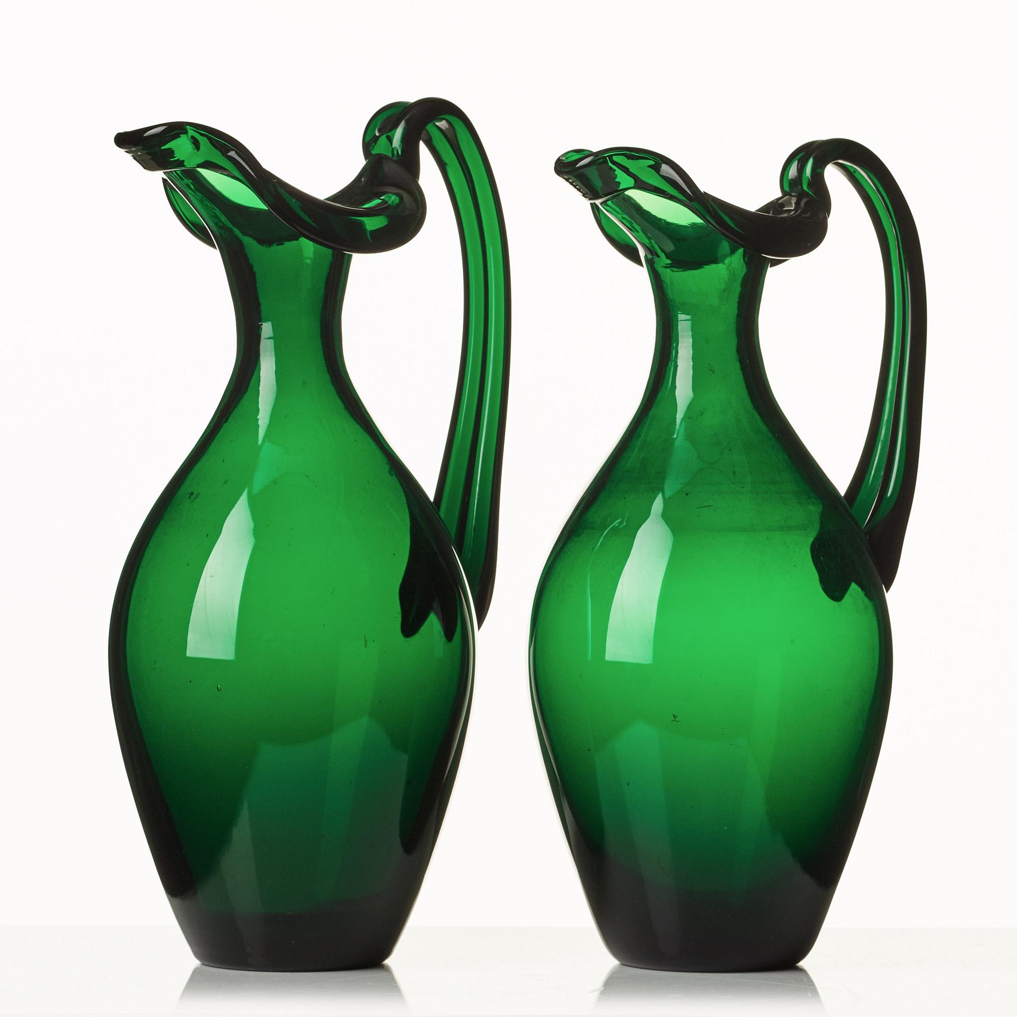 Edward Hald, two emerald green claret jugs, Sandvik's glassworks, Sweden ca 1929, model HS 1021.