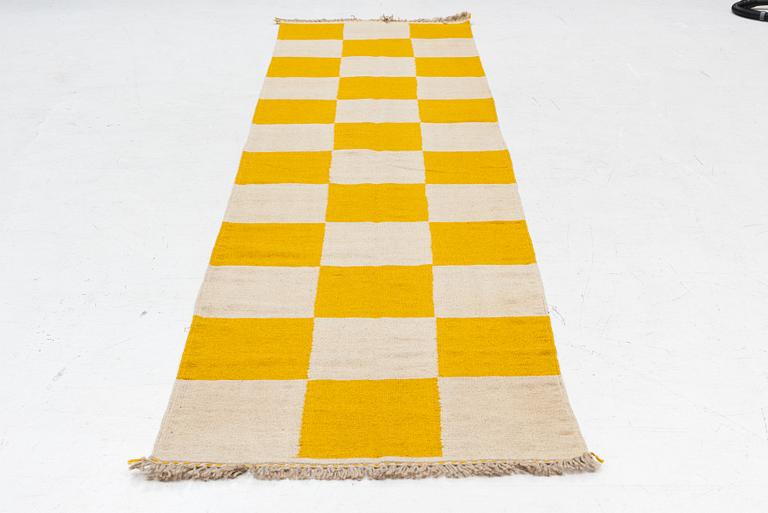 A Kelim runner, c. 344 x 90 cm.
