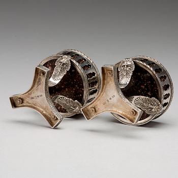 A pair of Swedish 19th century porphyry and silver salt-cellars, silver with mark of Gustaf Folcker, Stockholm 1823.