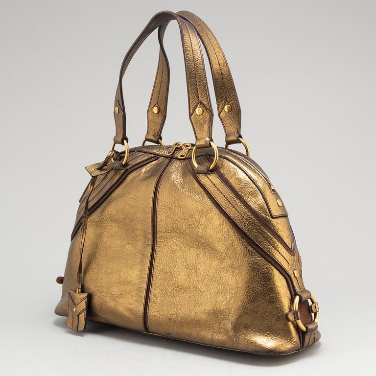 YVES SAINT LAURENT, a metallic bag.