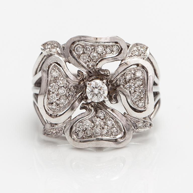 An 18K white gold flower ring with diamonds ca. 0.65 ct in total. Italy.