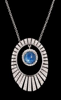 727. A gold, diamond and star sapphire pendant.