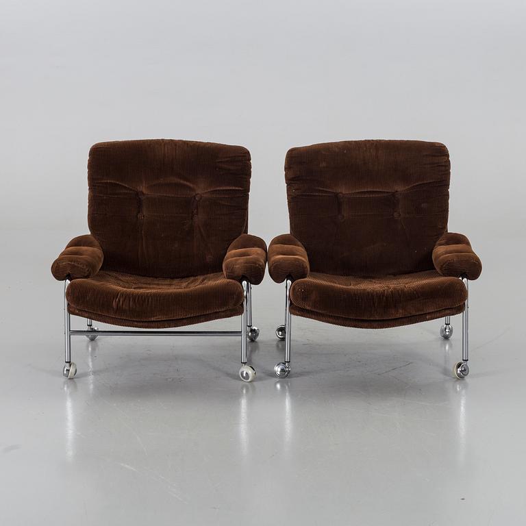TWO 1970`S ARMCHAIRS.