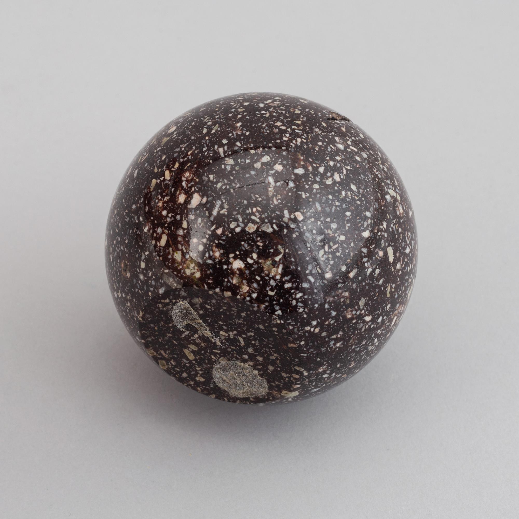An early 20th century  porphyry paper weight.