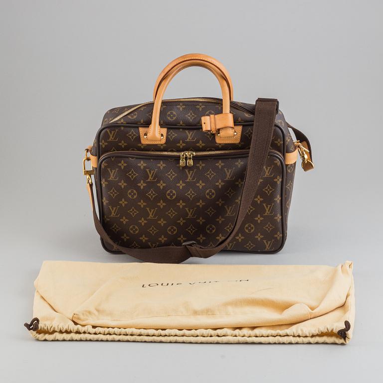 Louis Vuitton, a monogram canvas carry on bag.
