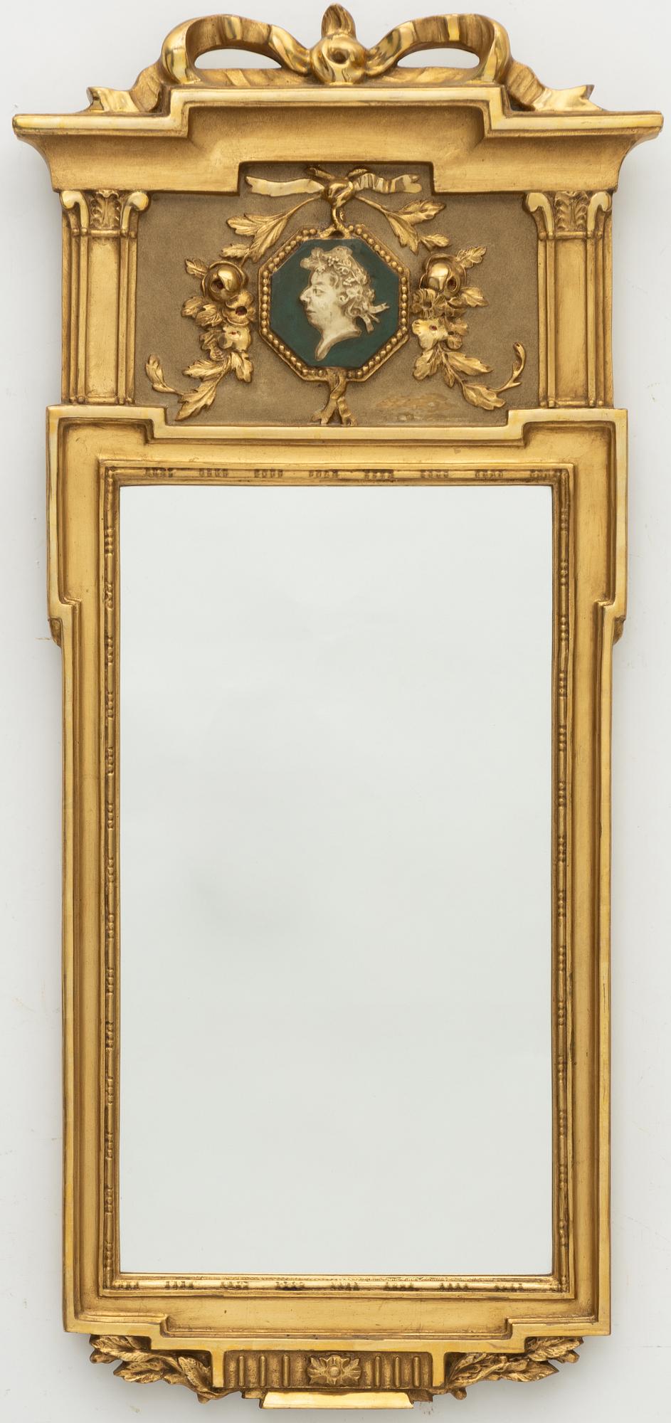 A Gustavian style mirror, mid-20th century.