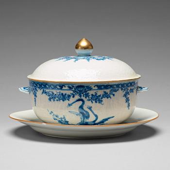 A blue and white armorial tureen with cover, and stand, Qing dynasty, 18th Century.