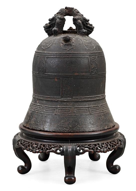 A large bronze temple bell, presumably Ming dynasty.