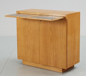 A Swedish elm cabinet attributed to Uno Åhrén, 1930's.