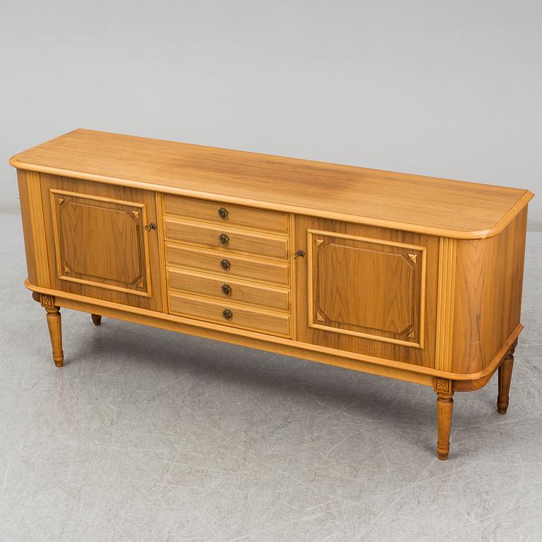 a gustavian style sideboard from the second half of the 20th century.