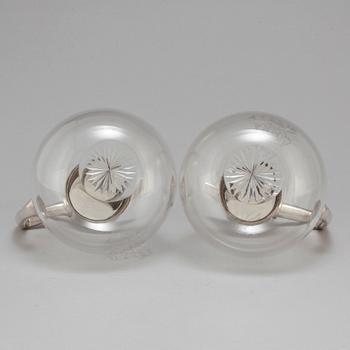 A pair of caraffes with silver mountings by CG Hallberg, Stockholm 1890.