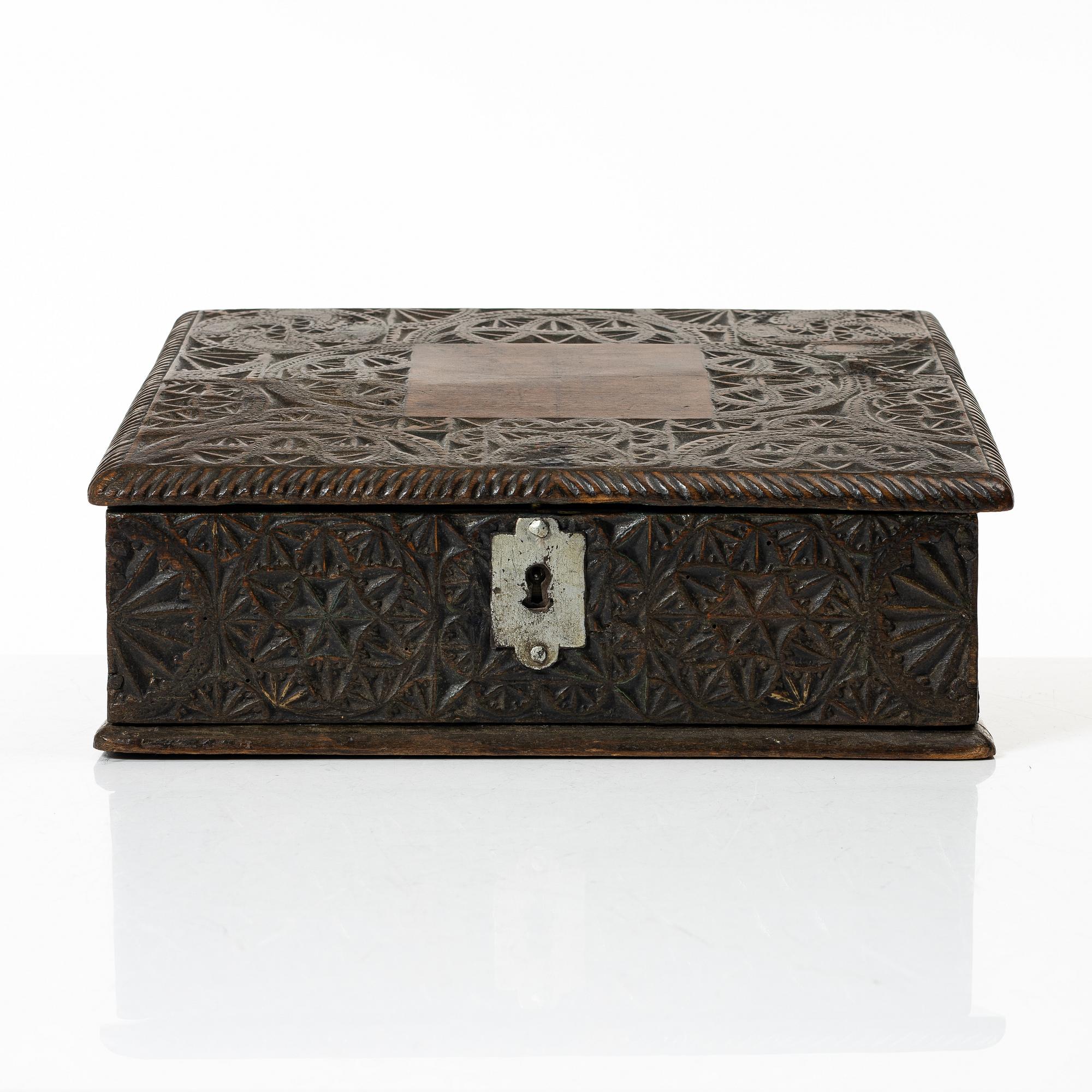 A carved wooden box, Sweden, 19th century.