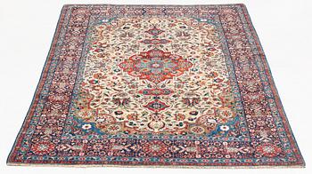 A rug, semi-antique, Teheran, part silk, 204 x 132 cm.