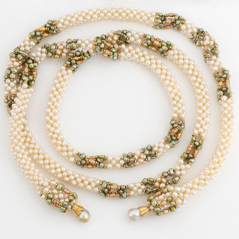 Green and white seed pearl with baroque shaped cultured pearl necklace.