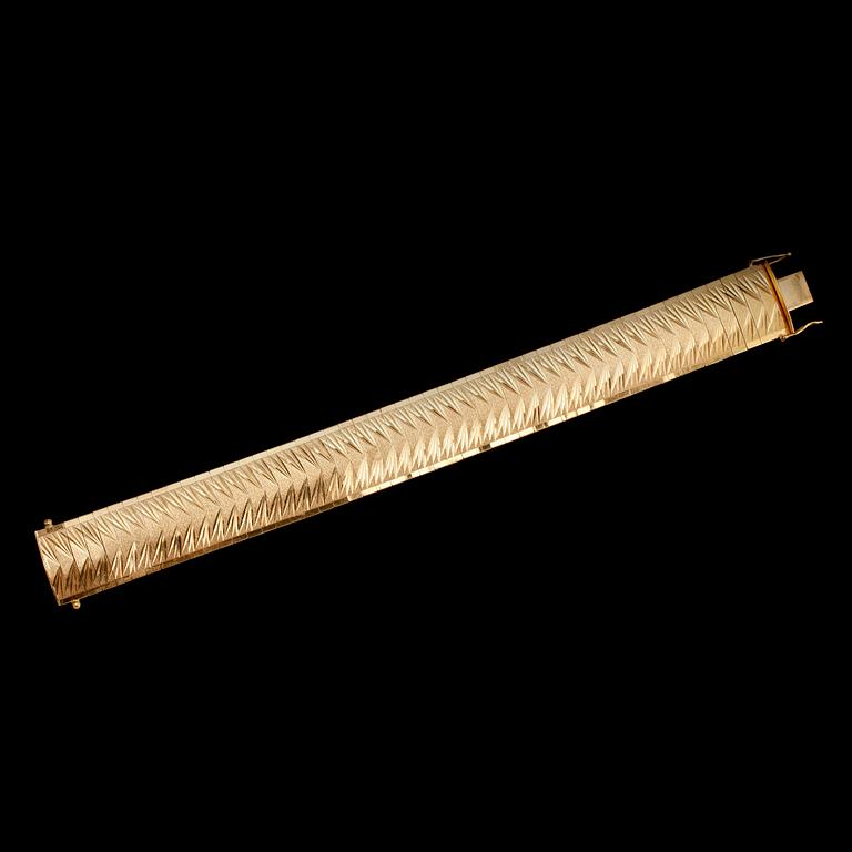 ARMBAND, 18 k guld, fantasimodell. Vikt ca 52 g.