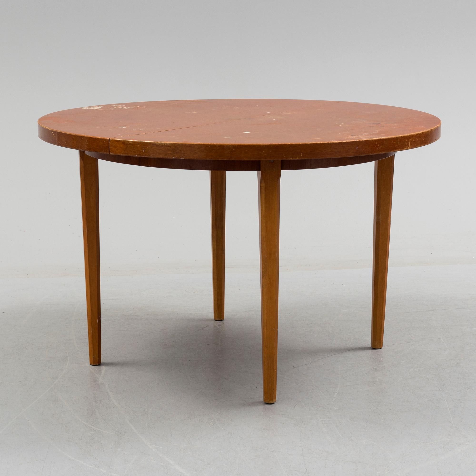 A 1940s mahogany veneer table.