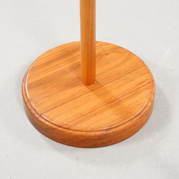 A floor lamp by carl Malmsten called "staken" from the second half of the 20th century.