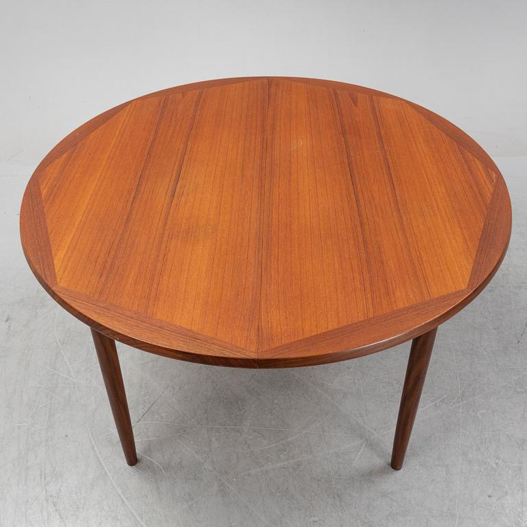 A teak 1950's/60's dining table.