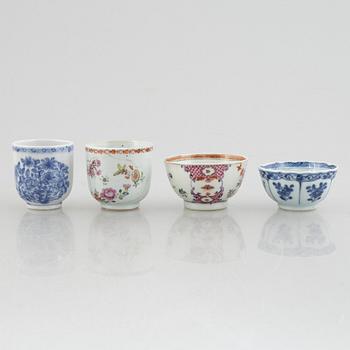 A creamer, seven porcelain cups and seven saucers, China, Qing dynasty, 18th century.