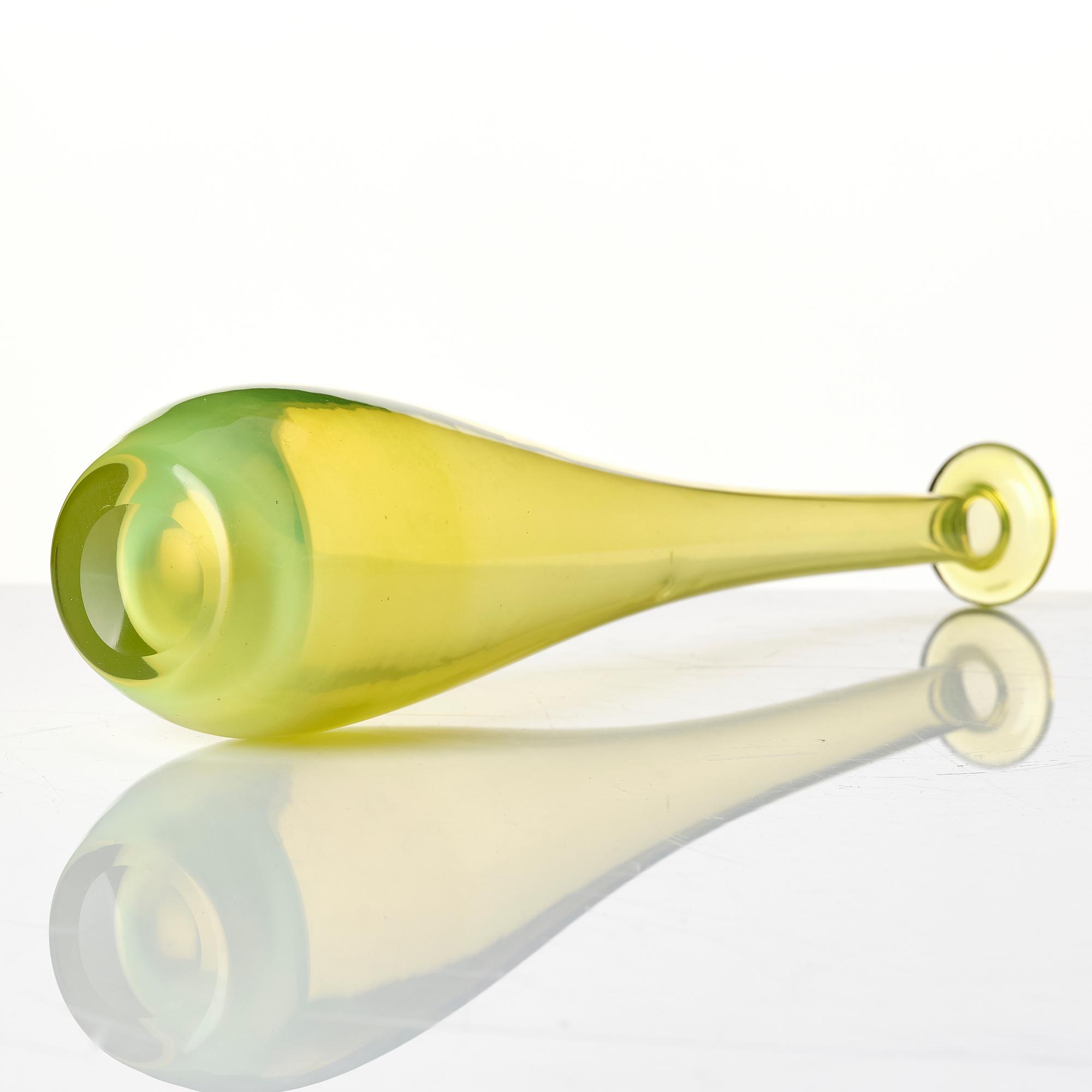 A glass bowl, a vase, a flacon, an ewer with stopper and a goblet, 20th century.