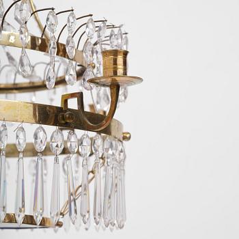 A late-Gustavian five-light gilt brass and cut glass chandelier, Stockholm, late 18th century.