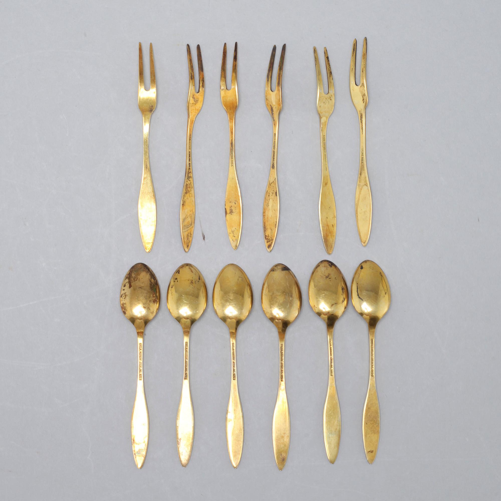 12 gilded silver spoons and small forks from Norway, around the mid 20th century.