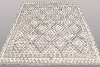A CARPET, Kilim, ca 242 x 178 cm.