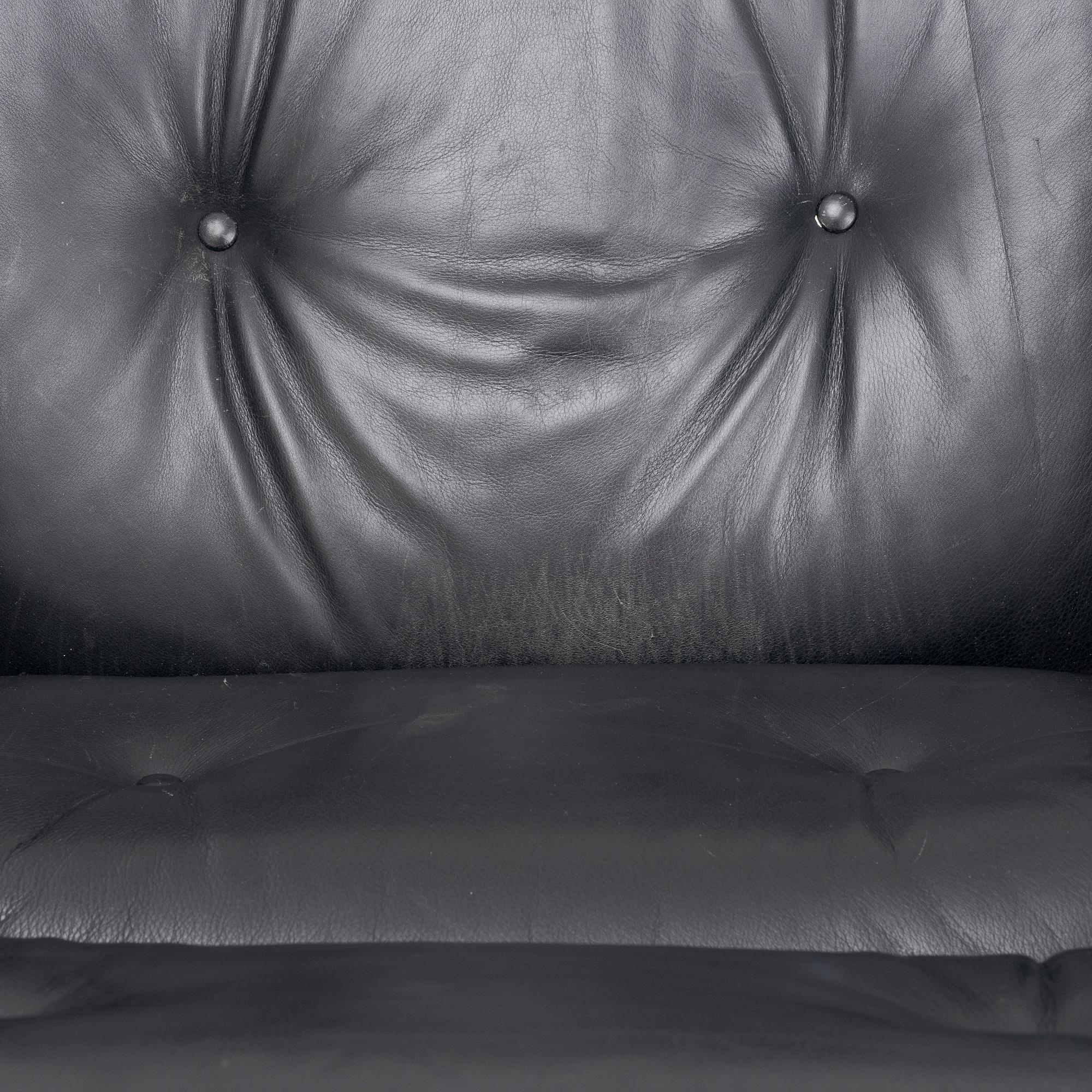 Charles & Ray Eames, an 'Eames Lounge Chair' with ottoman, Vitra.