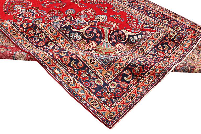 A carpet, Tabriz, ca. 338 x 243 cm.