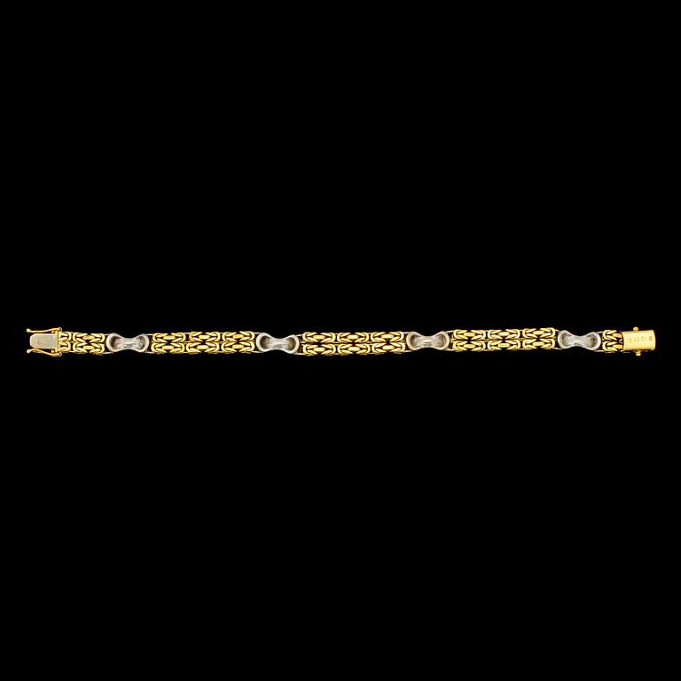 ARMLÄNK, 18k guld och vitguld med 24 små briljantslipade diamanter, tot 0.43 ct, importstämplat. Vikt 28 g.