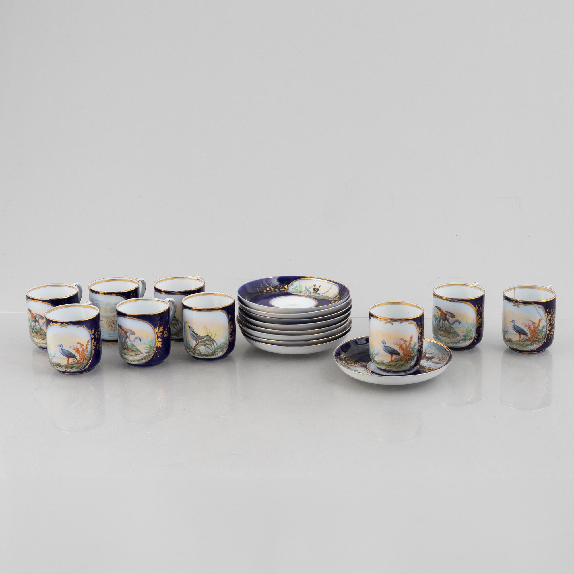 A set of nine porcelain coffee cups with saucers, Kuznetsov, Russia (1891-1917).