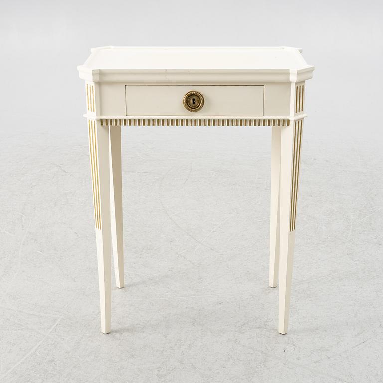 A Gustavian style side table, early 20th century.