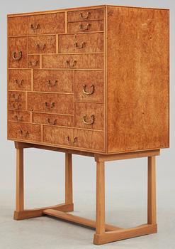 A Josef Frank burrwood, mahogany and walnut cabinet, Svenskt Tenn, model 881.