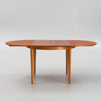 A dining table, 1950s/60s.