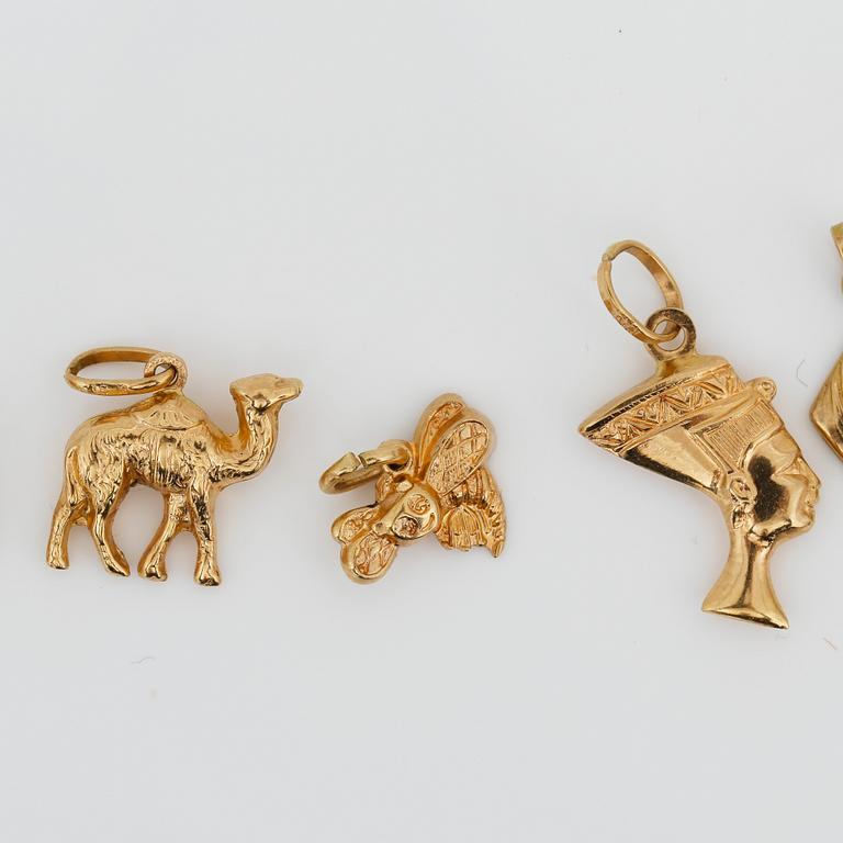 BERLOCKER, 10 st, 18K guld, sekelskiftet 2000-tals. Vikt ca 8,53 g.