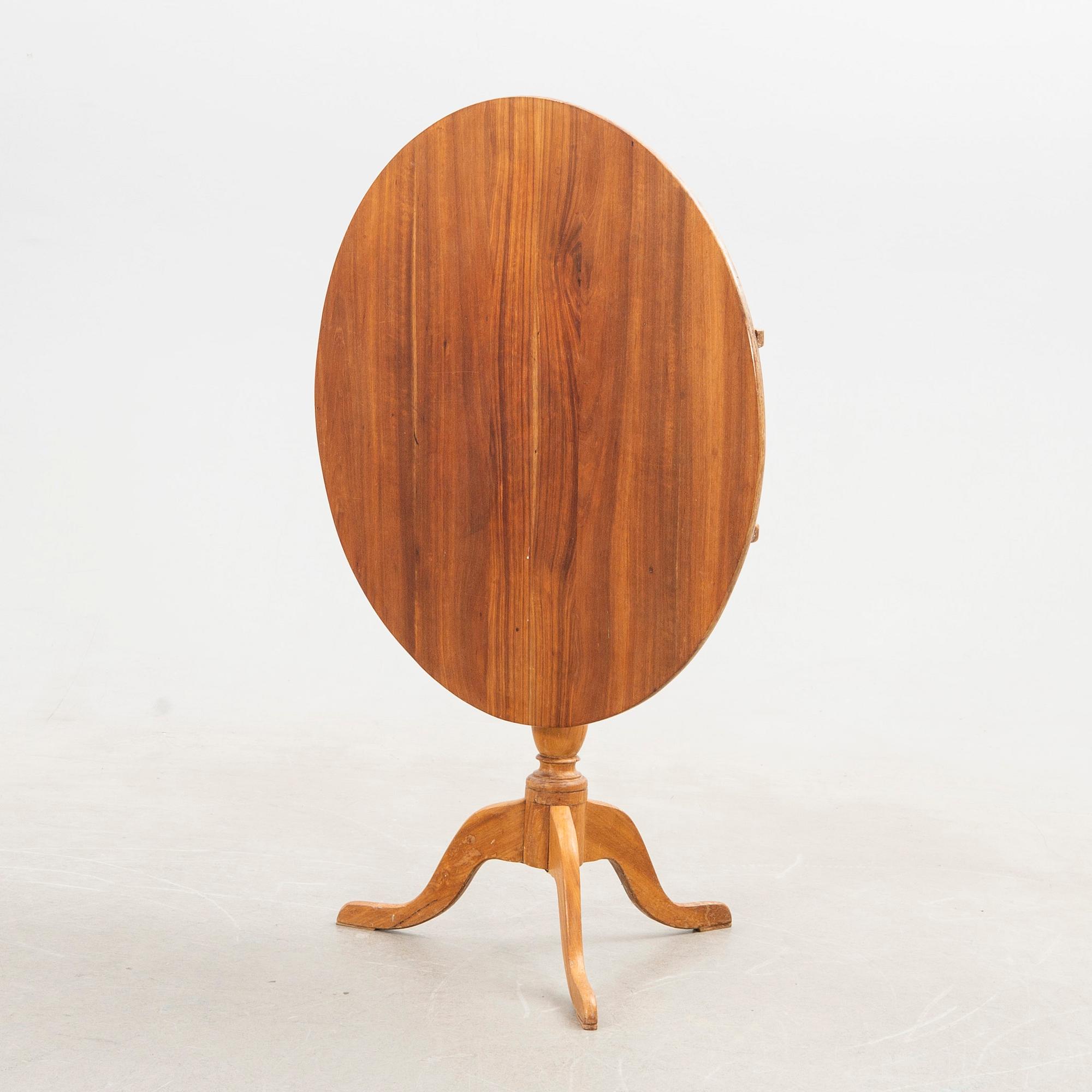 Folding table, 19th century, three-part base.