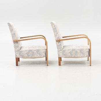 A pair of 1930's armchairs.