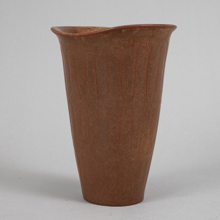 Tea pot, two bowls, two creamers, and a vase by Gunnar Nylund, stoneware, Rörstrand.