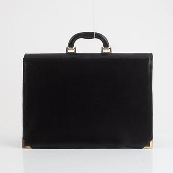 Cartier, a briefcase.